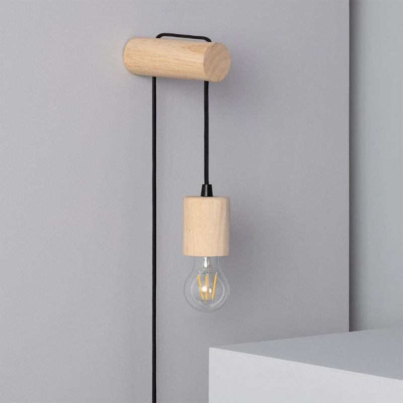 la lampe de chevet suspendu bois torse sur un fond gris