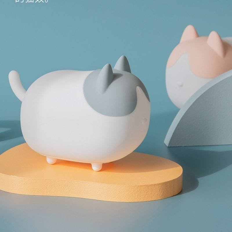 les deux veilleuse chat silicone sur table